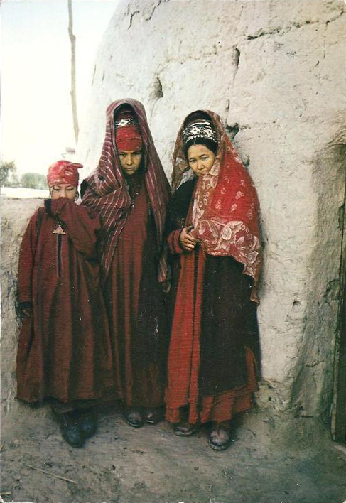 Afghan women wearing traditional garments.